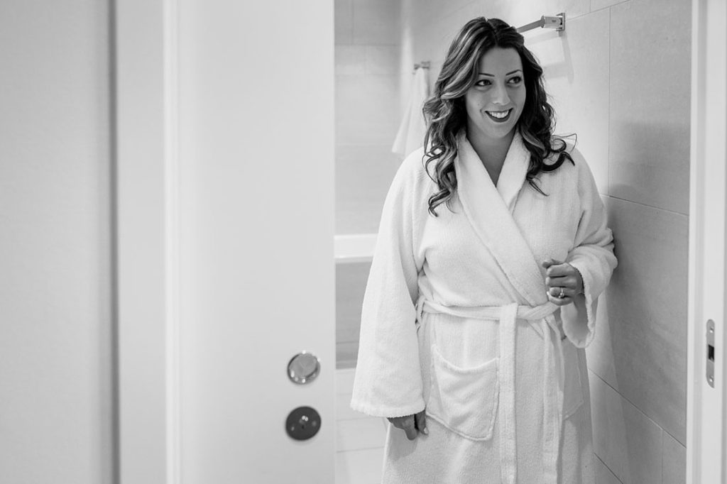 bride getting ready at hotel in Copenhagen, photos by Natalia Cury wedding photography