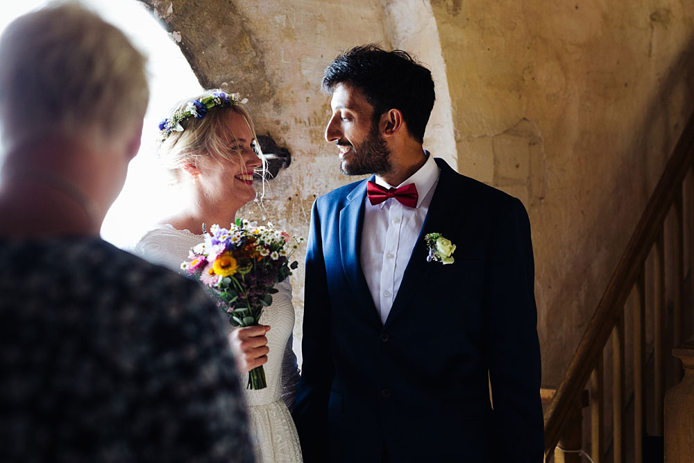 bride and groom getting married in the old church of Stevns, in Stevns Klint, Denmark