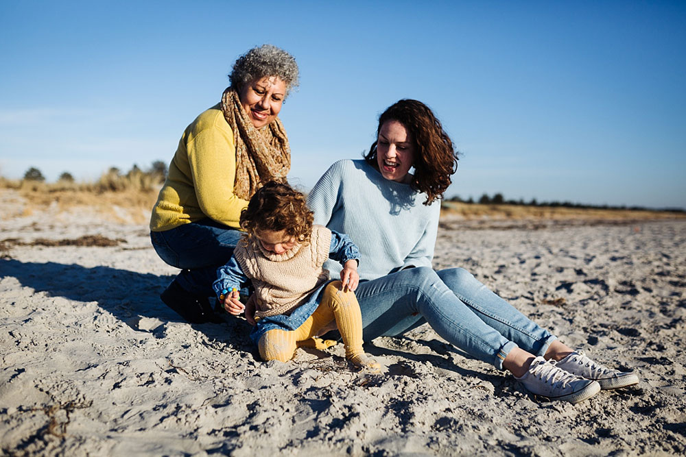 family portraits at the beach in Copenhagen. Natural family photos in Copenhagen, Denmark.