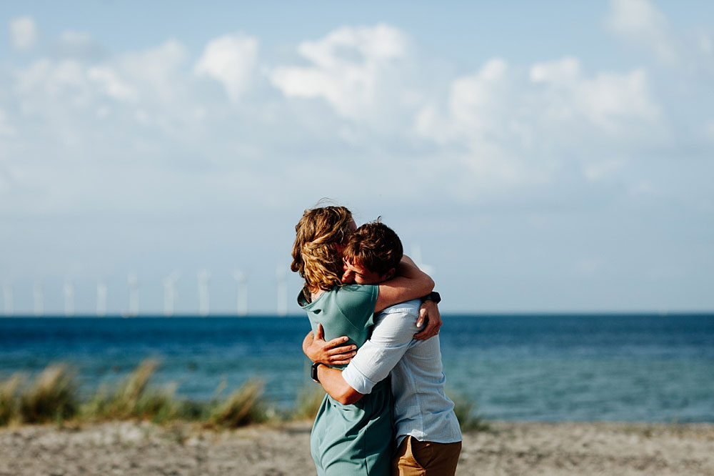 secret proposal photo shoot at the beach in Copenhagen