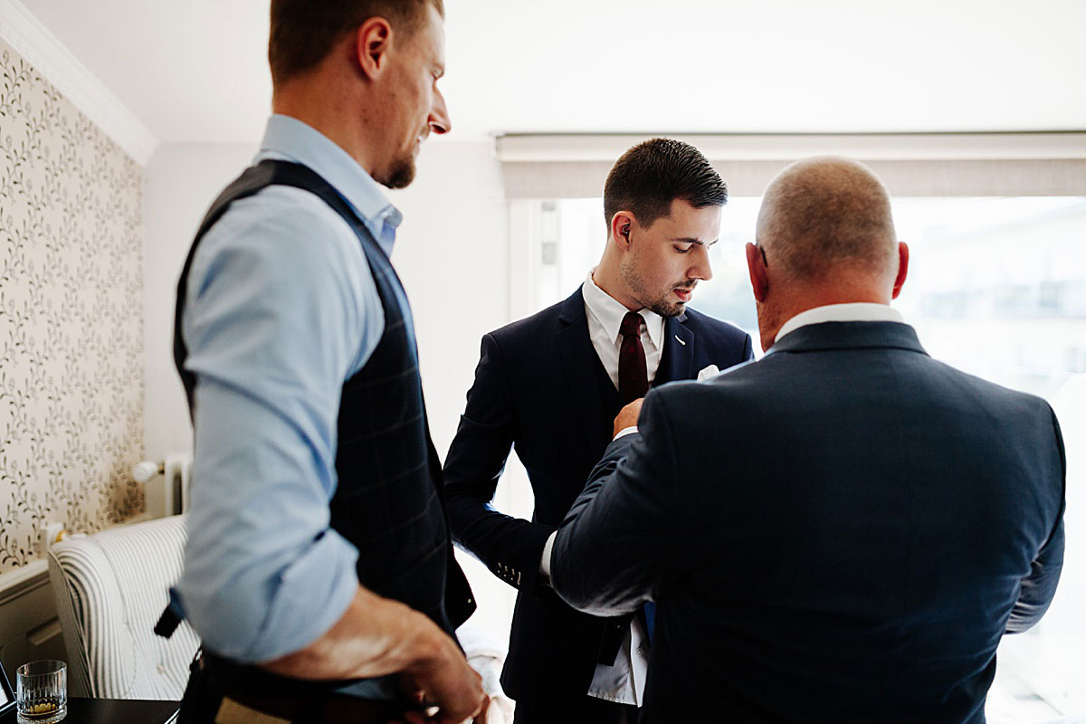 groom getting ready at Marienlyst Strandhotel