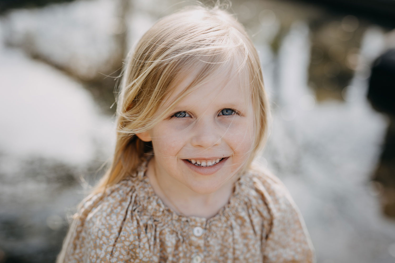 Portrait photography in Copenhagen: A close-up of a girl smiling and looking happy