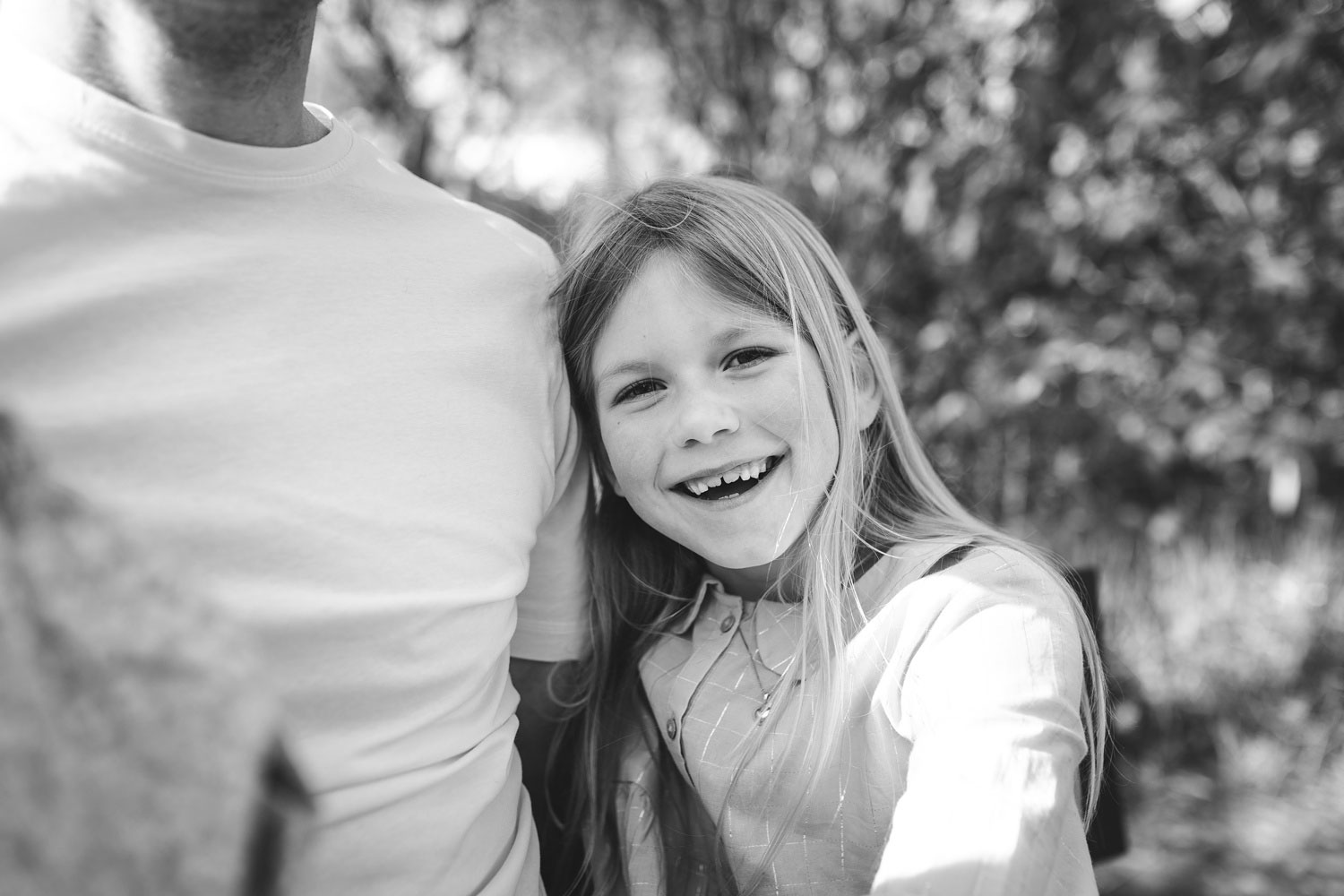 Portrait photography in Copenhagen: A close-up of a girl smiling and looking happy