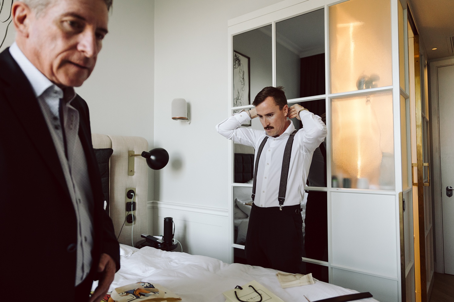 Groom getting ready at Hotel Villa before Copenhagen City Hall wedding