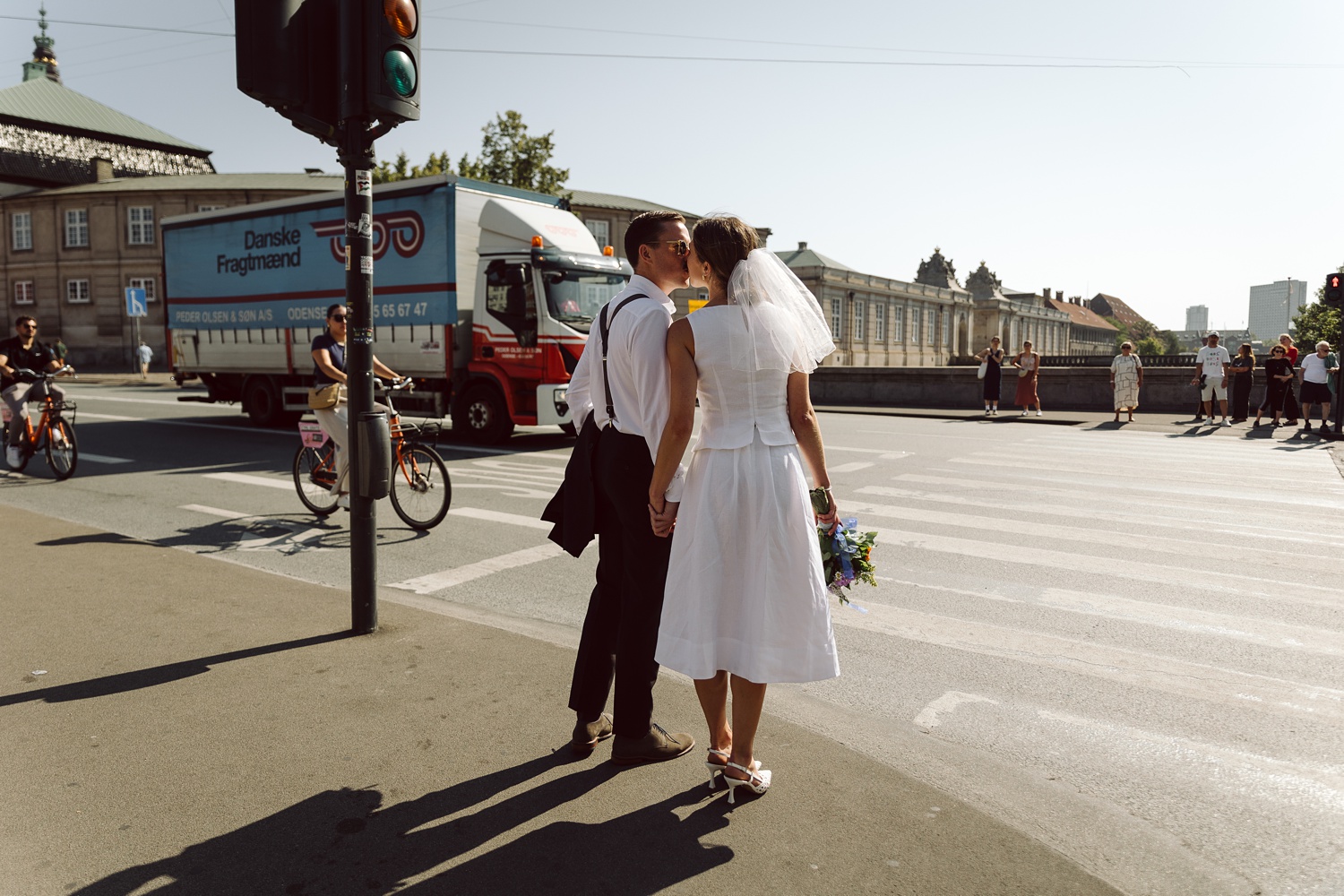 Bride and groom walking through the streets of Copenhagen 